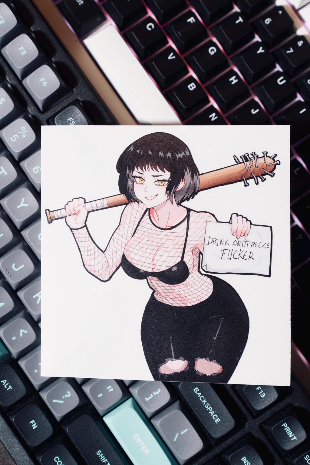 sticker of a busty anime girl holding a baseball and sign.