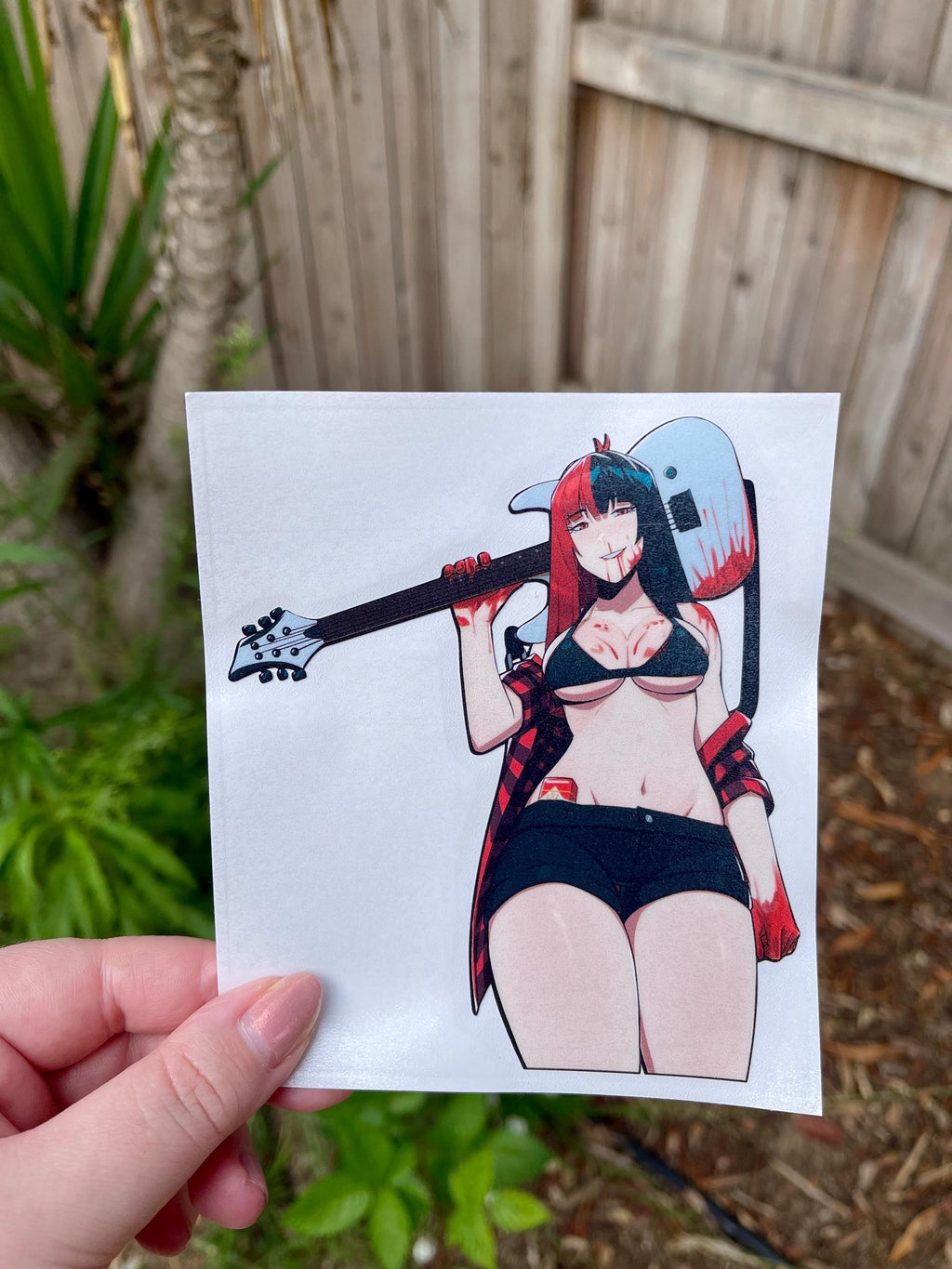sticker a busty anime girl with red and black hair with a red flannel holding a white guitar