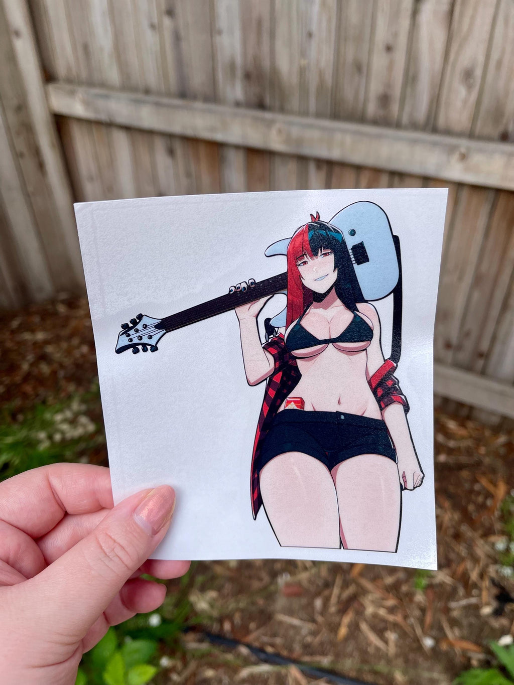 sticker a busty anime girl with red and black hair with a red flannel holding a white guitar